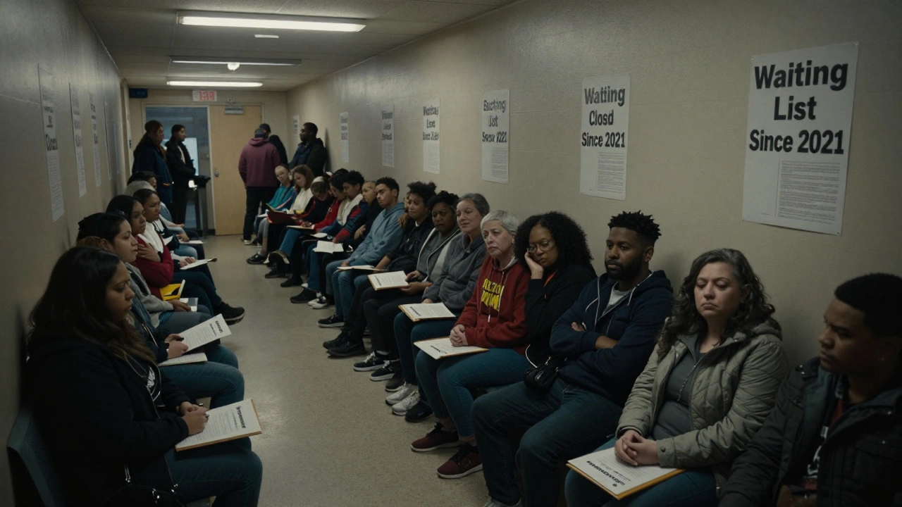A crowded waiting room at Chicago Housing Authority with people lined up for Section 8 vouchers.